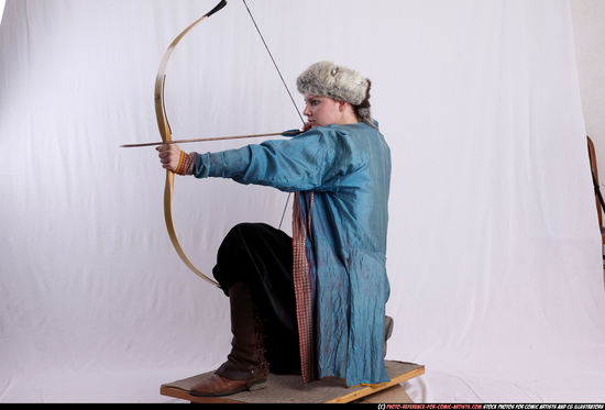 Woman Adult Average White Fighting with bow Kneeling poses Army