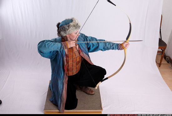 Woman Adult Average White Fighting with bow Kneeling poses Army