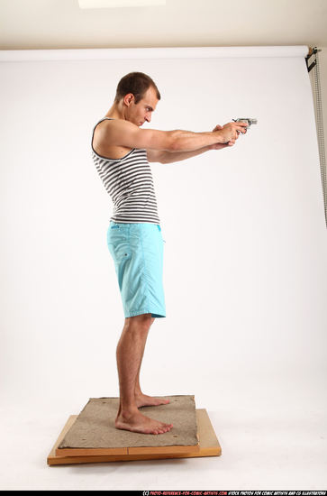 Man Adult Athletic White Fighting with gun Standing poses Sportswear