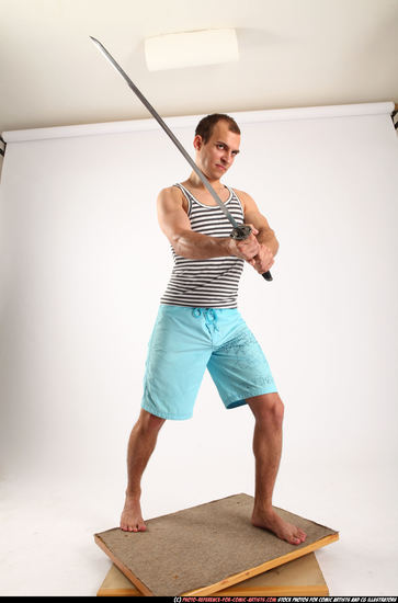 Man Adult Muscular White Fighting with sword Standing poses Sportswear