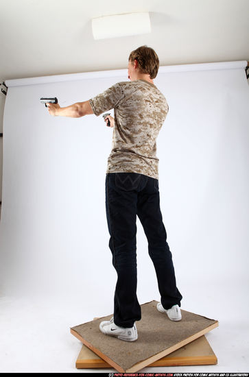 Man Adult Athletic White Fighting with gun Standing poses Casual