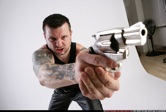 Man Adult Athletic White Fighting with gun Kneeling poses Casual