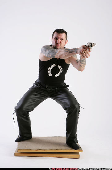 Man Adult Athletic White Fighting with gun Kneeling poses Casual