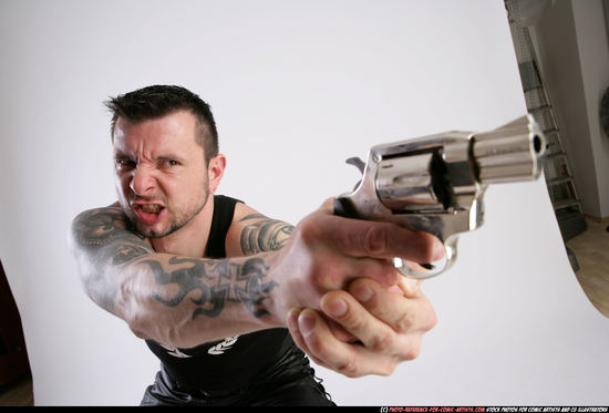 Man Adult Athletic White Fighting with gun Kneeling poses Casual