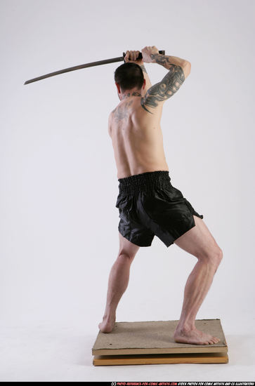 Man Adult Athletic White Fighting with sword Standing poses Sportswear