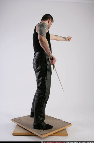 Man Adult Athletic White Fighting with sword Standing poses Casual