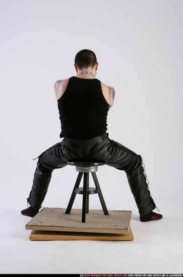 Man Adult Athletic White Daily activities Sitting poses Casual