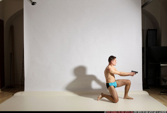 Man Adult Athletic White Fighting with gun Moving poses Underwear