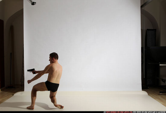 Man Adult Athletic White Fighting with gun Moving poses Underwear