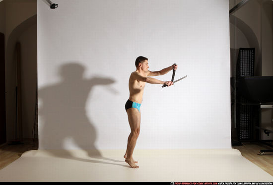 Man Adult Athletic White Fighting with sword Moving poses Underwear