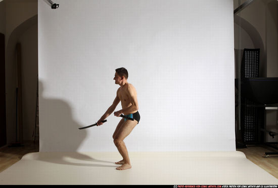 Man Adult Athletic White Fighting with sword Moving poses Underwear