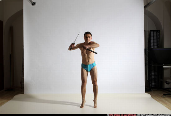 Man Adult Athletic White Fighting with sword Moving poses Underwear