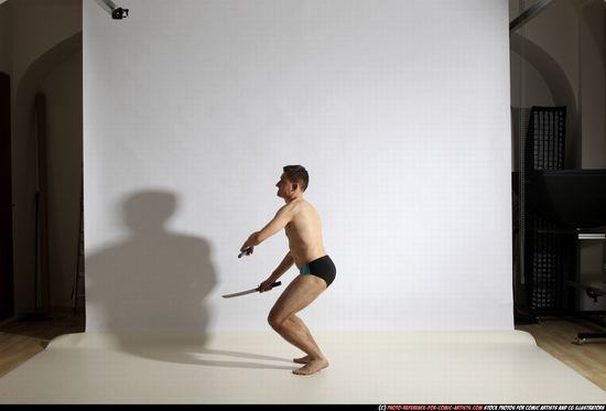 Man Adult Athletic White Fighting with sword Moving poses Underwear