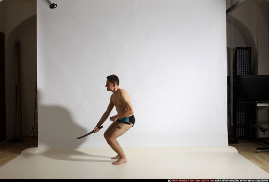 Man Adult Athletic White Fighting with sword Moving poses Underwear