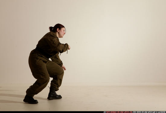 Woman Adult Average White Martial art Moving poses Army