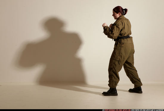 Woman Adult Average White Martial art Moving poses Army