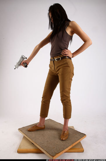 Woman Young Athletic Fighting with submachine gun Standing poses Army Asian