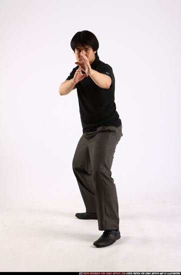 Man Adult Average Fist fight Standing poses Casual Asian