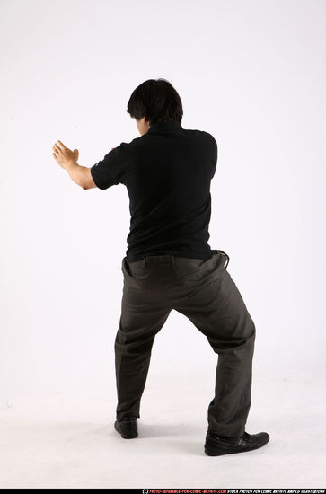 Man Adult Average Fist fight Standing poses Casual Asian