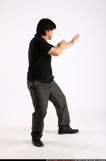 Man Adult Average Fist fight Standing poses Casual Asian