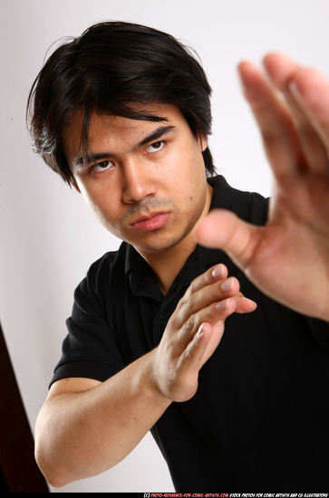 Man Adult Average Fist fight Standing poses Casual Asian