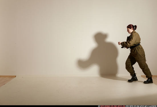 Woman Adult Average White Fighting with gun Moving poses Army