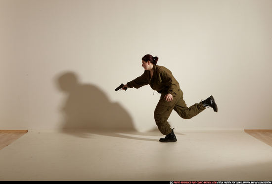 Woman Adult Average White Fighting with gun Moving poses Army