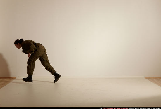 Woman Adult Average White Fighting with gun Moving poses Army