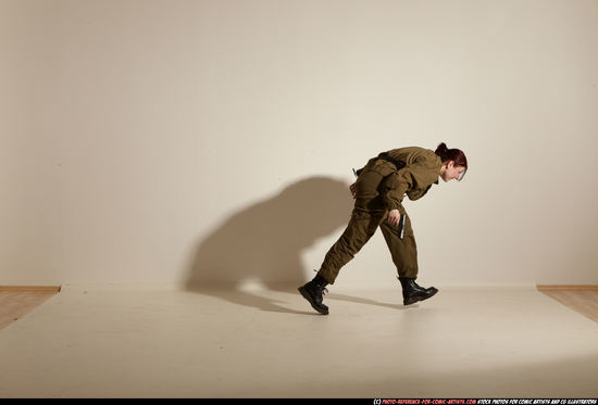 Woman Adult Average White Fighting with gun Moving poses Army