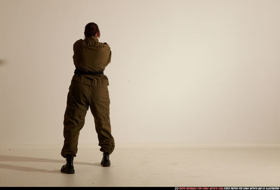 Woman Adult Average White Fighting with gun Moving poses Army