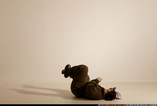 Woman Adult Average White Fighting with gun Moving poses Army