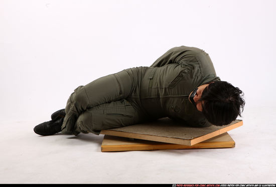 Man Adult Average Neutral Laying poses Army Asian