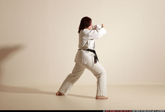 Woman Adult Average White Martial art Moving poses Sportswear