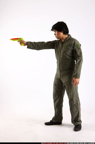 Man Adult Average Fighting with gun Standing poses Army Asian