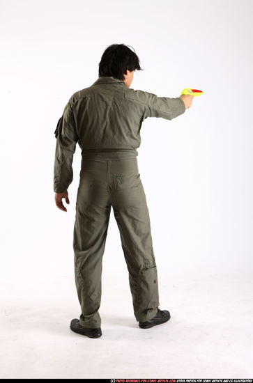 Man Adult Average Fighting with gun Standing poses Army Asian