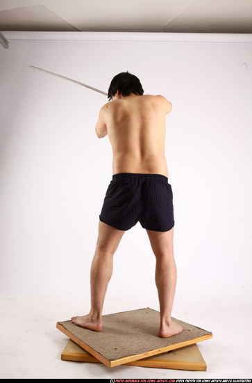 Man Adult Average Fighting with sword Standing poses Underwear Asian