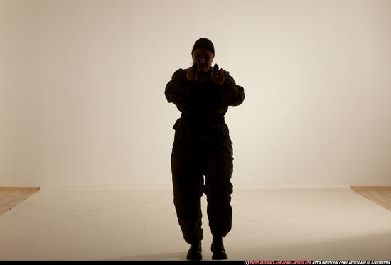 Woman Adult Average White Fighting with gun Moving poses Army