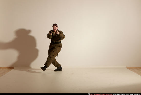 Woman Adult Average White Fighting with gun Moving poses Army