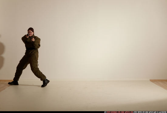 Woman Adult Average White Fighting with gun Moving poses Army