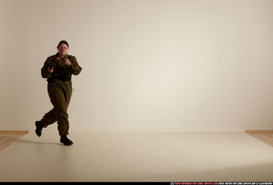 Woman Adult Average White Fighting with gun Moving poses Army