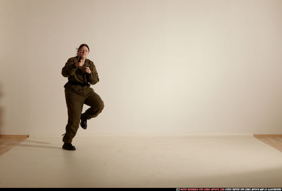 Woman Adult Average White Fighting with gun Moving poses Army