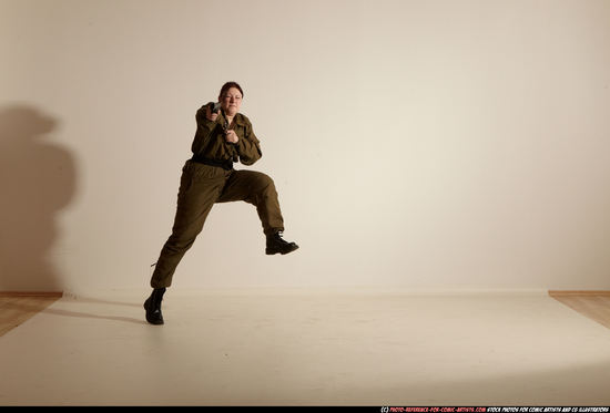 Woman Adult Average White Fighting with gun Moving poses Army