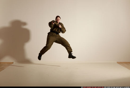 Woman Adult Average White Fighting with gun Moving poses Army