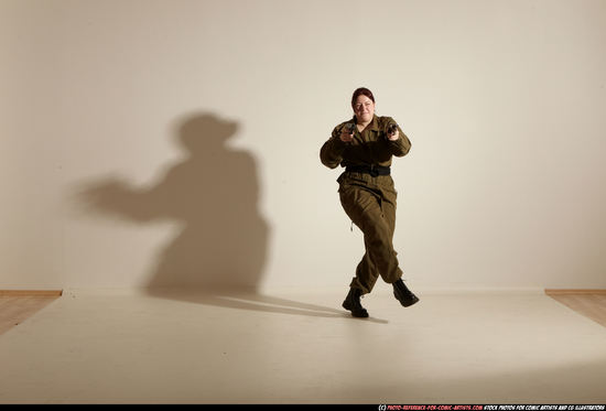 Woman Adult Average White Fighting with gun Moving poses Army