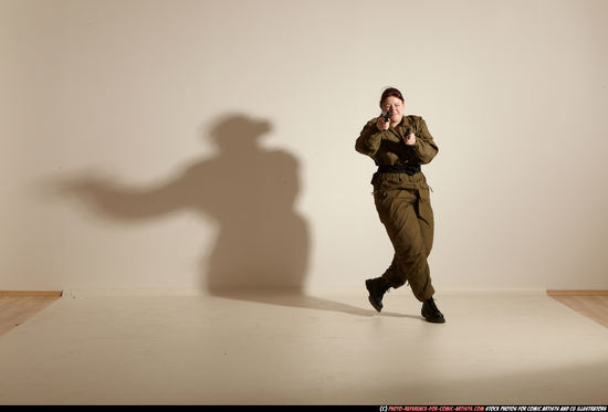 Woman Adult Average White Fighting with gun Moving poses Army