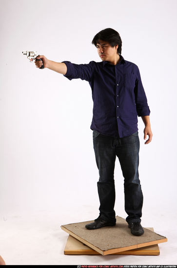 Man Adult Average Fighting with gun Standing poses Casual Asian