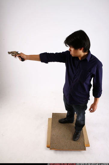 Man Adult Average Fighting with gun Standing poses Casual Asian