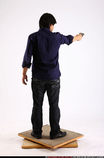 Man Adult Average Fighting with gun Standing poses Casual Asian