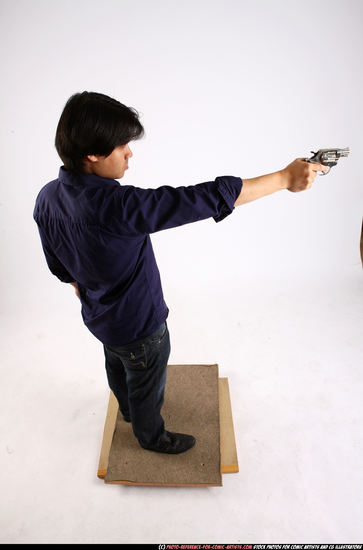 Man Adult Average Fighting with gun Standing poses Casual Asian