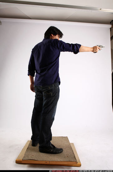 Man Adult Average Fighting with gun Standing poses Casual Asian